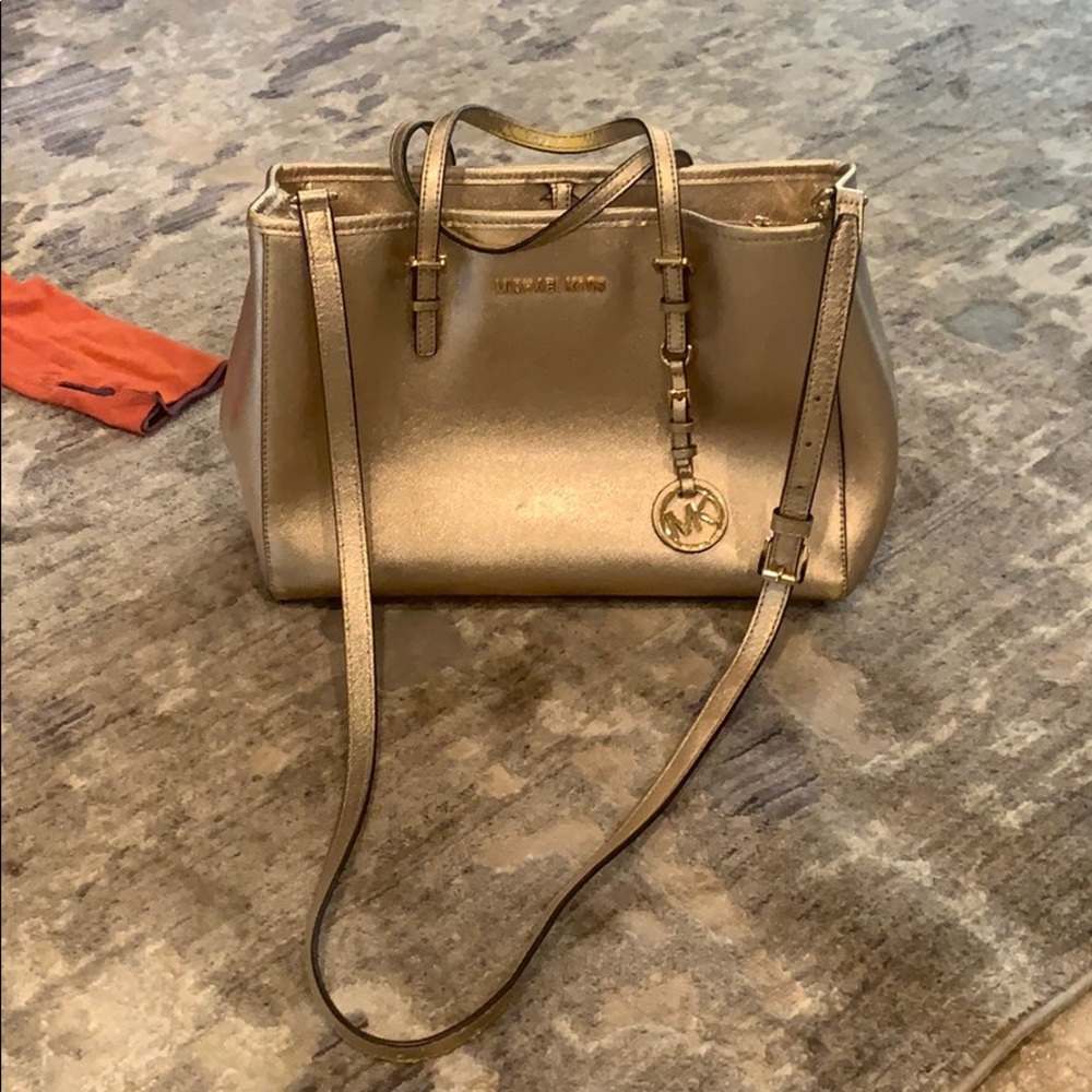Micheal Koran’s purse. Gold gorgeous